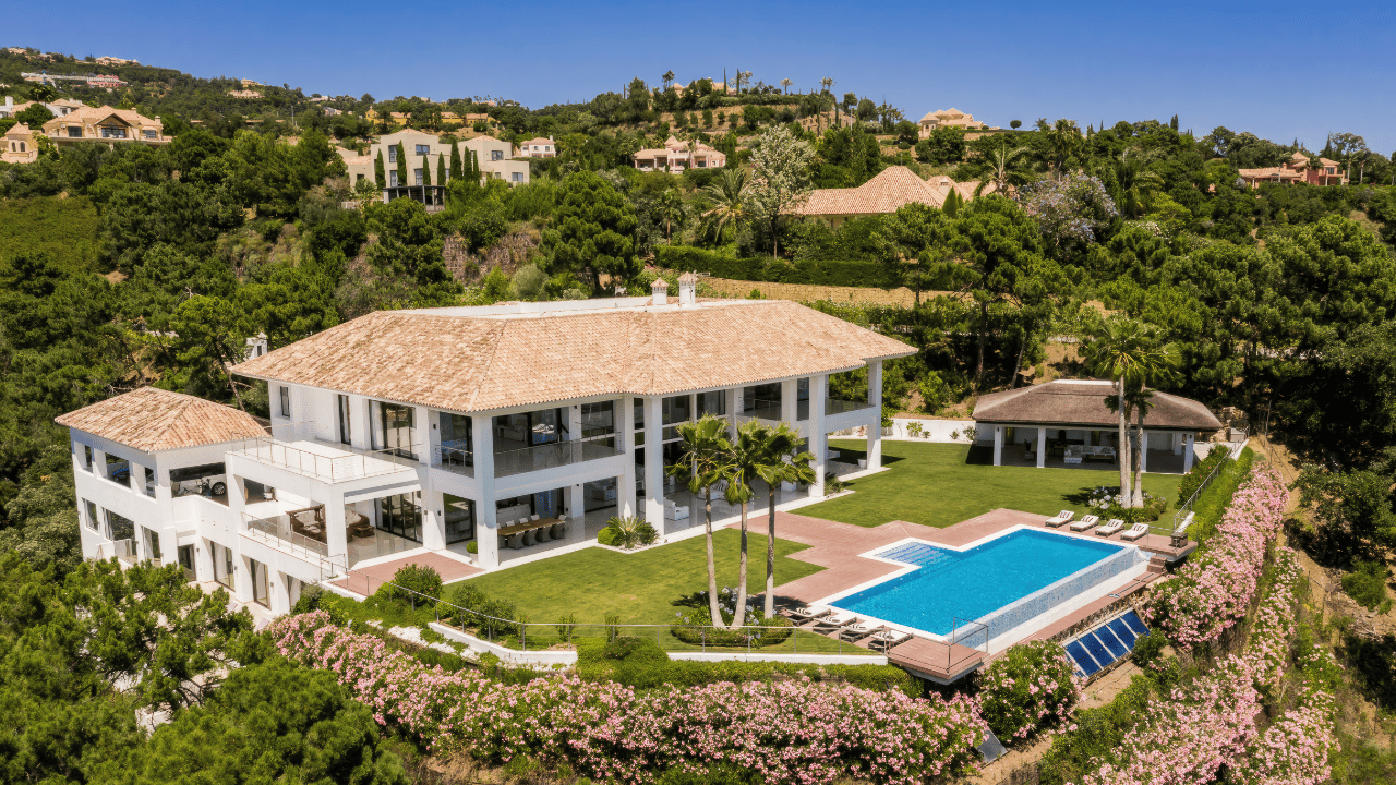 Luxury villa with a spacious garden and pool in La Zagaleta, showcasing the serene surroundings and exclusivity of the area