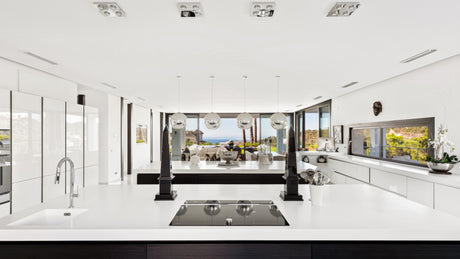 Luxury modern kitchen with panoramic views in a private villa in La Zagaleta, ideal for hosting exclusive dining experiences with private chefs