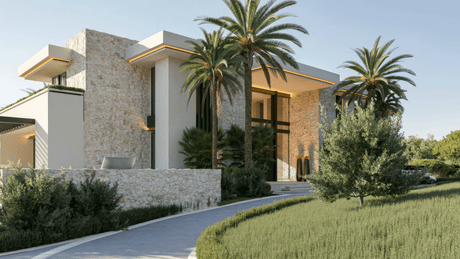 Luxury villa designed by Tobal Architects in Marbella, showcasing modern architecture with stone facades, lush landscaping, and a grand entrance framed by palm trees