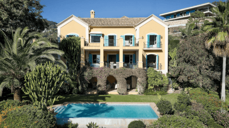 Charming Andalusian-style villa with lush gardens, a private swimming pool, and elegant architecture in El Madroñal, Benahavis