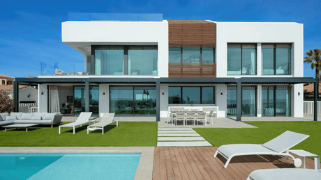 Beachfront villa for sale in New Golden Mile with modern design and luxury amenities