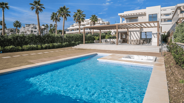 Frontline beach villa for sale near Puerto Banus with private pool and spacious outdoor area