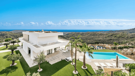 Modern villa for sale in Monte Mayor with panoramic sea views and infinity pool