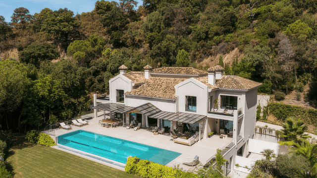 Elegant villa in La Zagaleta featuring sea views and a spacious outdoor pool area