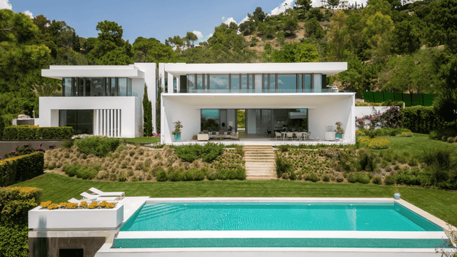 Contemporary villa for sale in La Reserva de Alcuzcuz, offering elegant architecture, stunning views, and premium outdoor living spaces