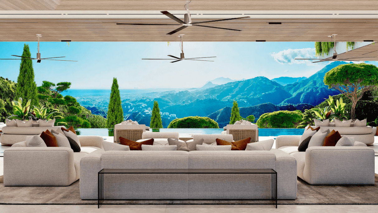 Luxury villa interior with panoramic mountain and valley views in La Zagaleta, blending indoor and outdoor living spaces